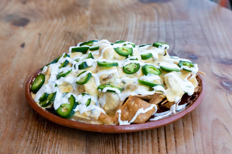 Loaded nachos with cheese and jalapeños